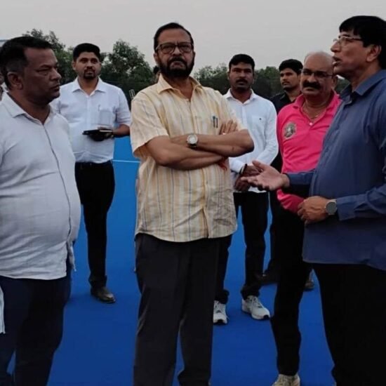 Minister Pujari Inspects Progress at Hockey Stadium